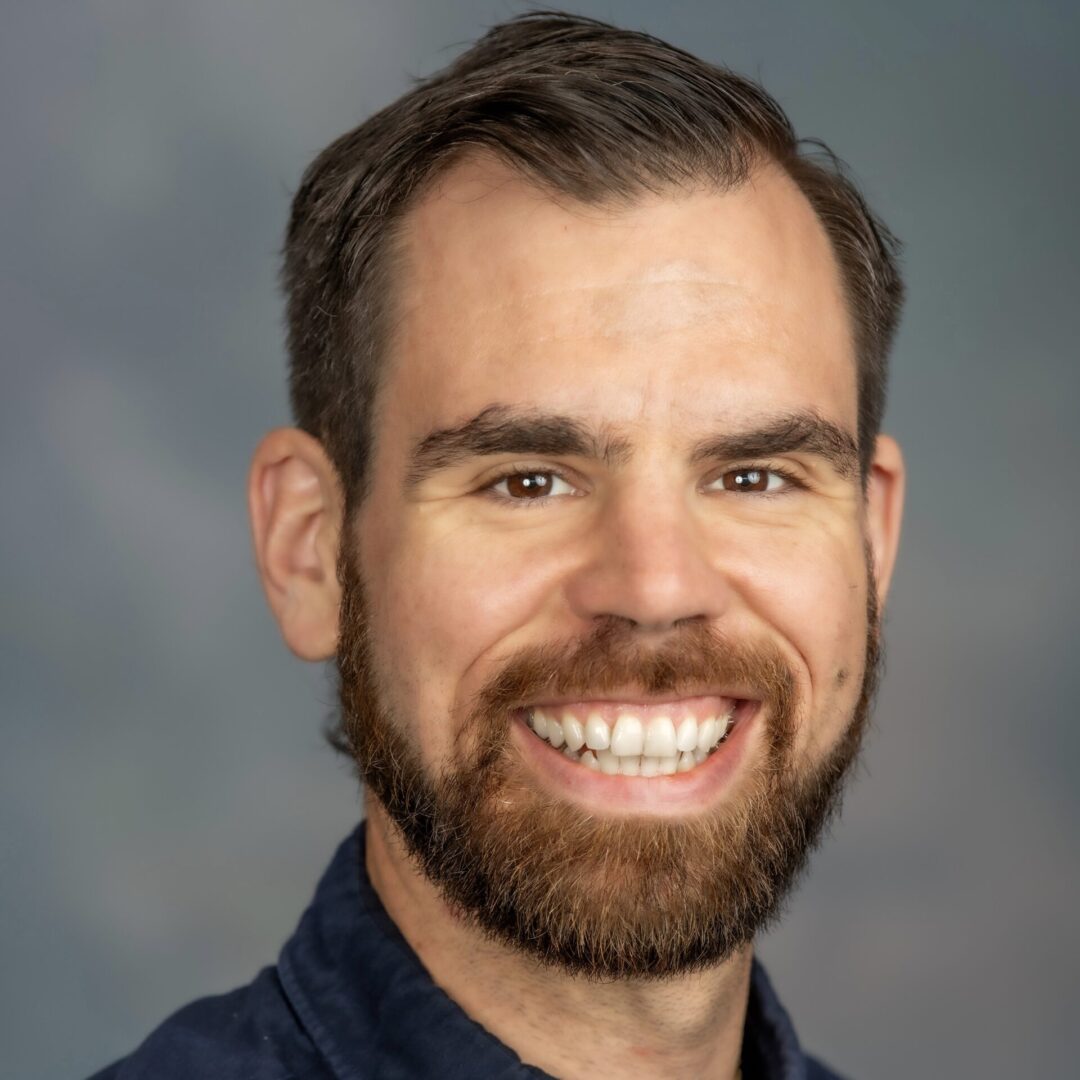 Smiling man with a beard